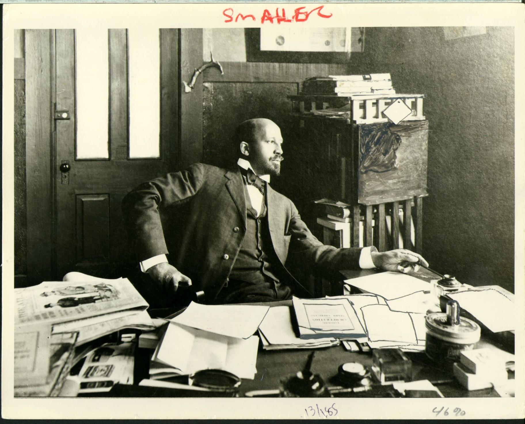 W.E.B. Du Bois seated at desk in office at Atlanta University, 1909. (Special Collections and University Archives, University of Massachusetts Amherst Libraries)