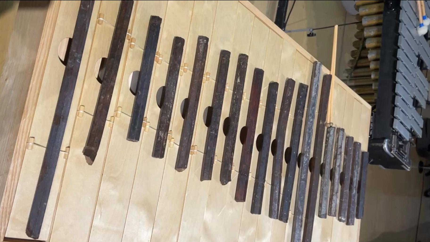 In 2021, the oldest section of Cook County Jail was demolished. Artist Maria Gaspar gathered 18 cell bars from the demolition and created this “sonic sculpture” to be played like a xylophone. (Blair Paddock / WTTW News)