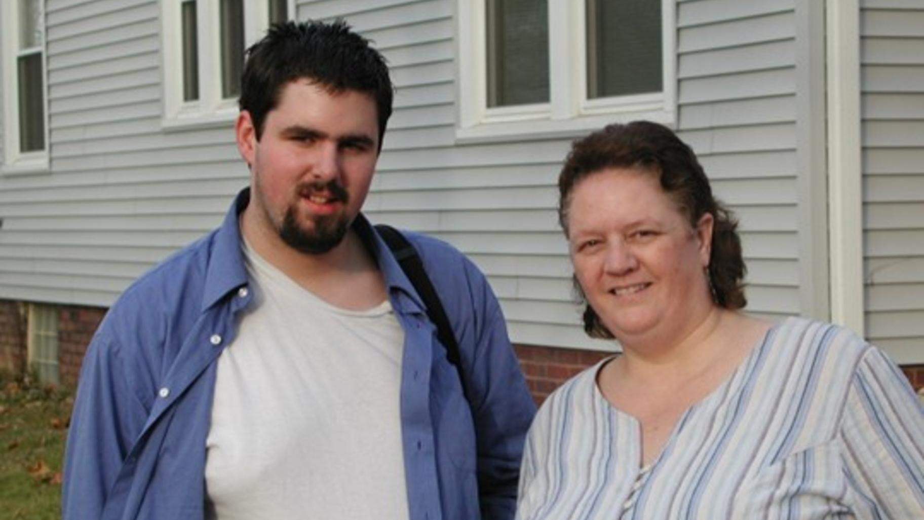 Samuel Rutherford with his mother, Betty, in his late teen years, outside a state-run group home. He’d been transferred there after leaving a treatment facility for boys in Utah. (Courtesy of Betty Rutherford)