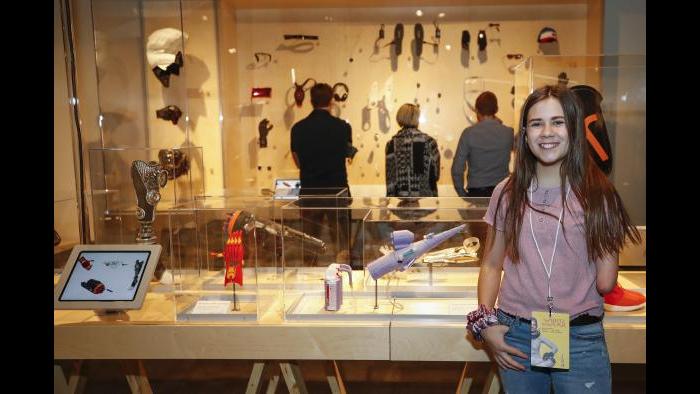 Born without a part of her left arm, 13-year-old Jordan Reeves poses with her 3-D printed prosthetic she created called Project Unicorn – a glitter blasting cannon. (Courtesy MSI Chicago)
