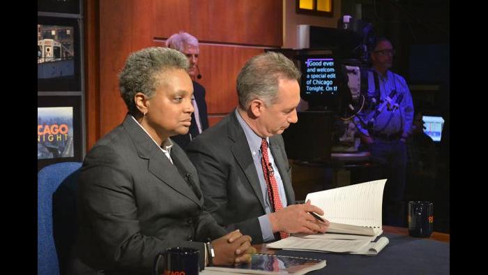 Lori Lightfoot, chair of the Police Accountability Task Force, and Joseph Ferguson, Chicago Inspector General, prepare for the forum.