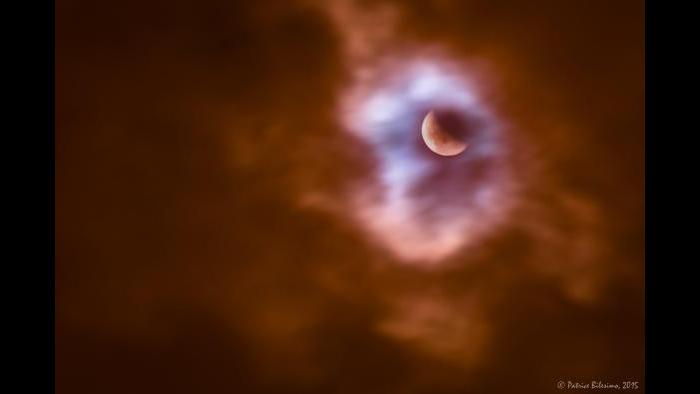 Photo by Patrice Bilesimo: From Chicago through a hole in the clouds.