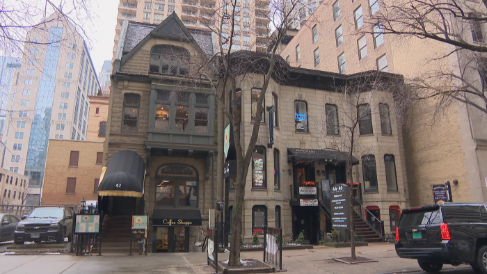 The Queen Anne building at 42 E. Superior St., left, and the Italianate building at 44-46 E. Superior St., right, were at risk of demolition, which triggered the city to review and move to preserve the buildings. (Felix Mendez / WTTW News)