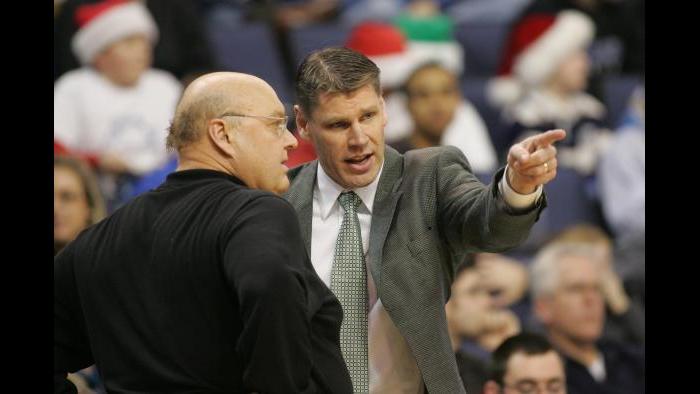 Porter Moser, right, talks to his former mentor, the late Rick Majerus.