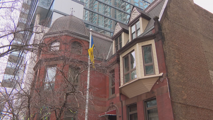 The brick and stone building at 10 E. Huron St. was designed in the Queen Anne style. (Felix Mendez / WTTW News)