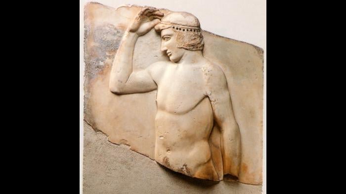 Metaphor for Democracy This relief shows a young athlete placing an olive wreath on his head, which has become a symbol of Athenian democracy. (National Archaeological Museum, Athens)