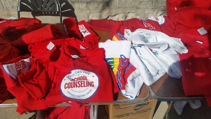 CTU workers distribute strike materials Monday at union headquarters.
