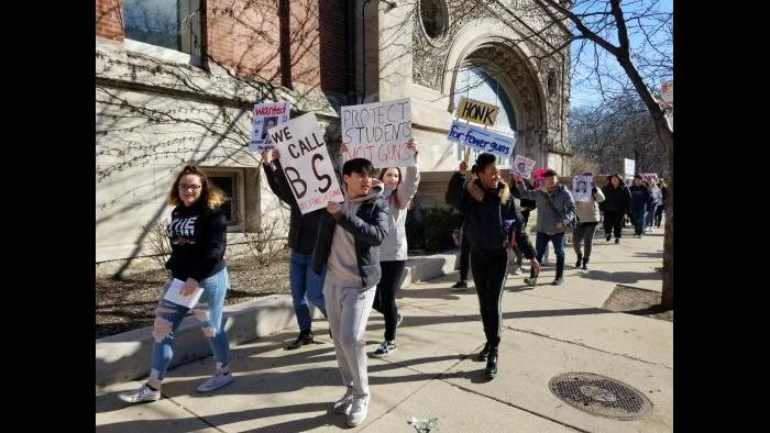 Students march outside Lake View High School. (Matt Masterson / Chicago Tonight)