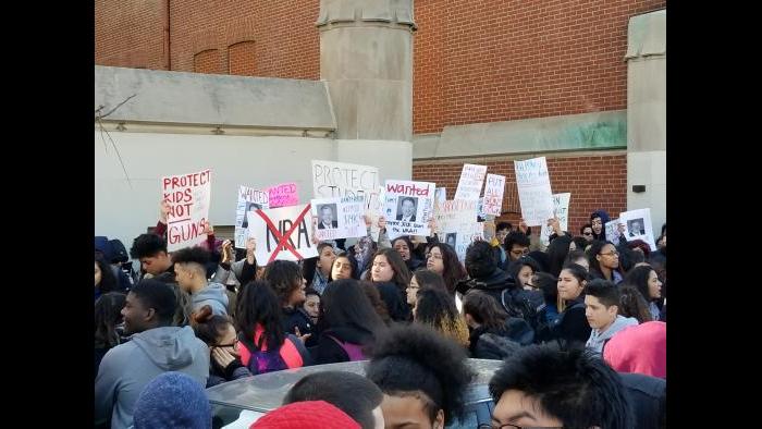 Students march outside Lake View High School. (Matt Masterson / Chicago Tonight)