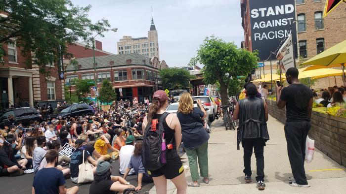 A march on Sunday, June 21, 2020 ends in Wicker Park near the Damen Blue Line CTA stop. (Amanda Vinicky / WTTW News)