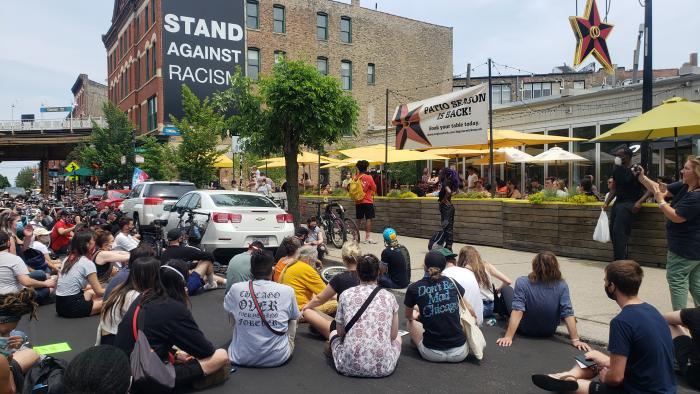 A march on Sunday, June 21, 2020 ends in Wicker Park near the Damen Blue Line CTA stop. (Amanda Vinicky / WTTW News)
