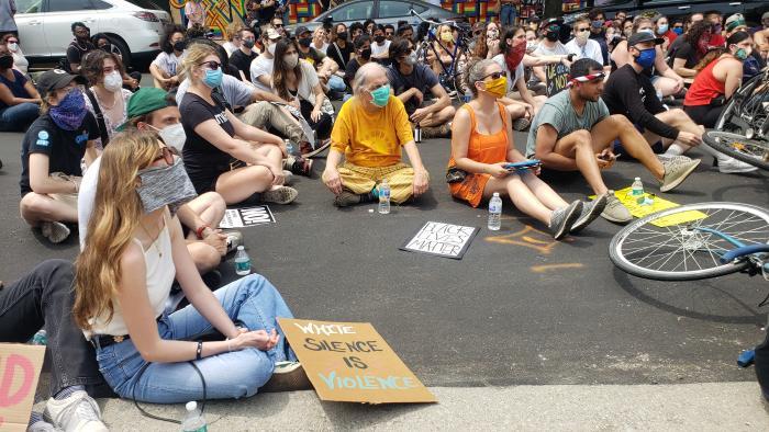 A march on Sunday, June 21, 2020 ends in Wicker Park near the Damen Blue Line CTA stop. (Amanda Vinicky / WTTW News)