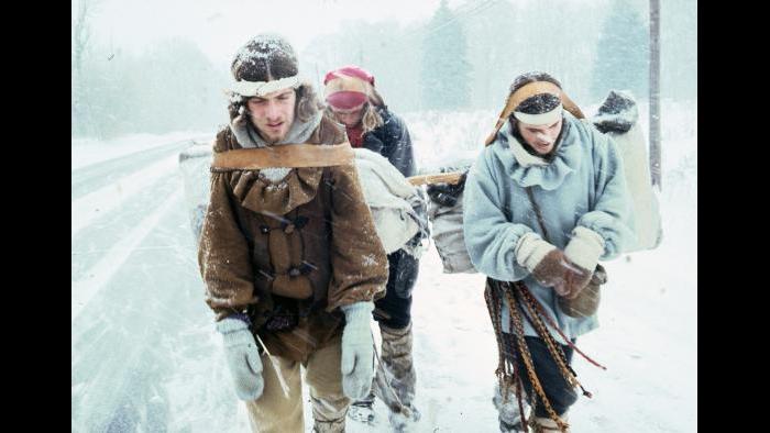 Bob Kulcik, Keith Gorse, and Clif Wilson walk down a snowy road near the Indiana Dunes on December 20, 1976. (Photographers of the La Salle: Expedition II)