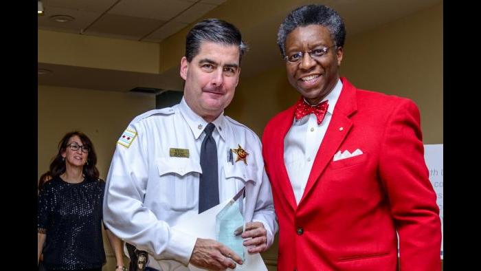 Commander Paul Bauer stands with Randall K. Blakey last December. (Credit: Gordon Walek)