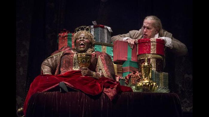 Lisa Gaye Dixon as the Ghost of Christmas Present and Larry Yando as Ebenezer Scrooge in “A Christmas Carol” at the Goodman Theatre. (Photo: Liz Lauren)