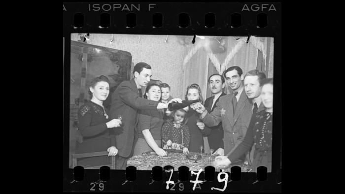 A family gathering [with Jakob Stopnicki, daughter Krysia and wife Tania (nee Biderman)], 1940-1944. (Courtesy of the Art Gallery of Ontario, Gift of the Archive of Modern Conflict) 