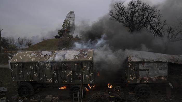 Smoke rises from an air defense base in the aftermath of an apparent Russian strike in Mariupol, Ukraine, Thursday, Feb. 24, 2022. Russian troops have launched their anticipated attack on Ukraine. (AP Photo / Evgeniy Maloletka)