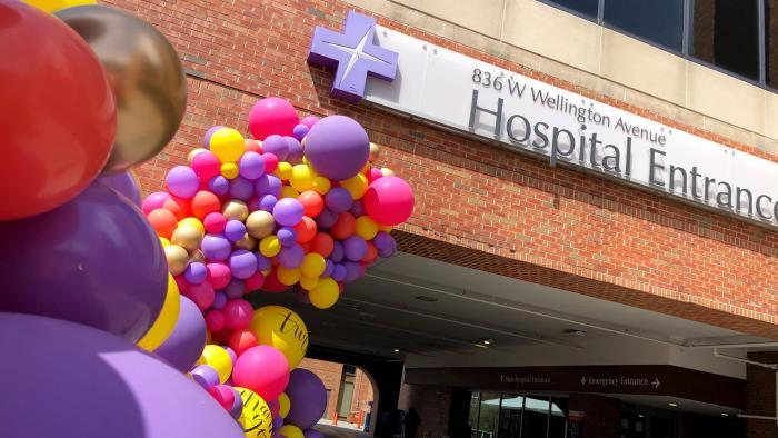A swag of balloons brightens up the entrance to Advocate Illinois Masonic Medical Center in Lakeview. (Patty Wetli / WTTW News)