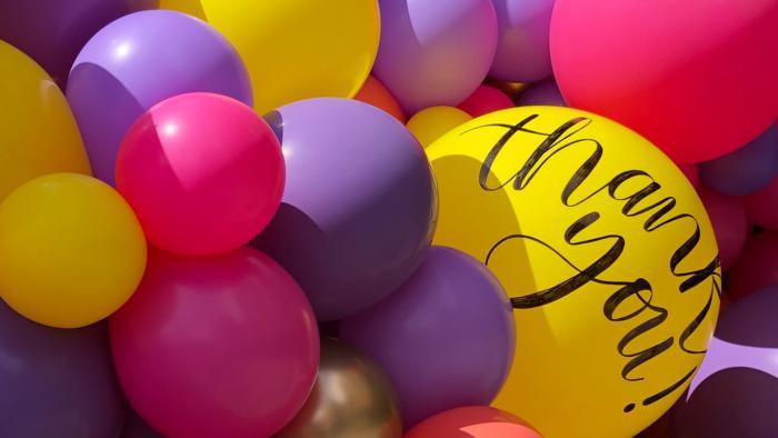 Artist Emmy Brown hand-lettered messages of gratitude on the balloons. Crowdfunding for the installation paid for her services, an important piece of Frei's mission to support her fellow artists. (Patty Wetli / WTTW News)