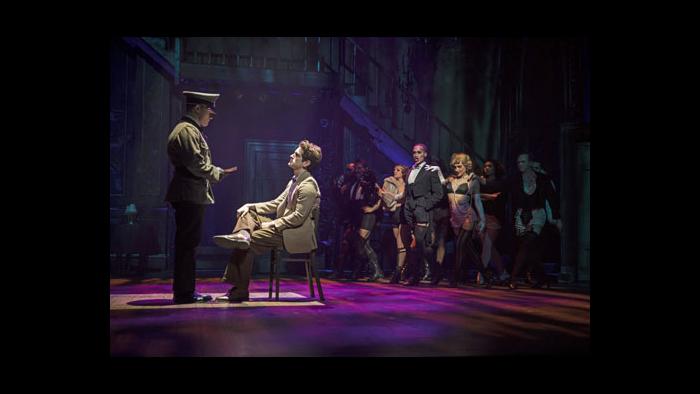 Clifford Bradshaw (Garrett Lutz, seated) is interrogated by a Nazi soldier (Liam Quealy). (Credit: Liz Lauren)