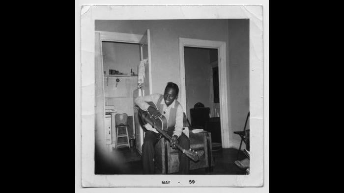 Curtis in his family's Cabrini-Green row house, May 1959. (Courtesy the author’s collection)