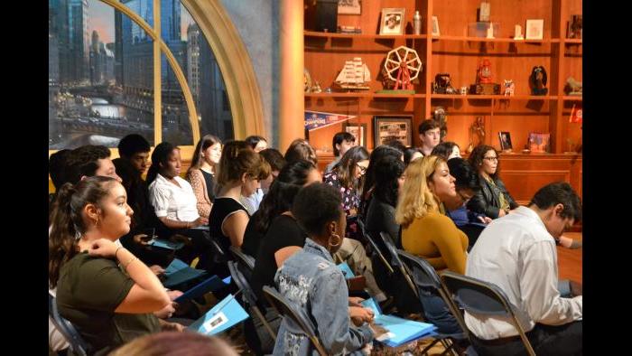 Mikva Challenge students wait for J.B. Pritzker to arrive on set. (Kristen Thometz / Chicago Tonight)