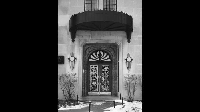 The Powhatan’s east entrance on Chicago Beach Drive is adorned with Indian figures standing guard in the grillwork of the doors, flanked by trios of arrows in the light fixtures.