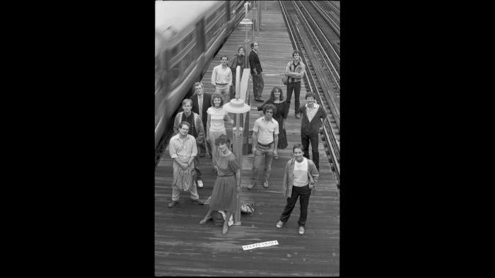 Cast members post on the CTA "L" platform. (Courtesy Steppenwolf Theatre)