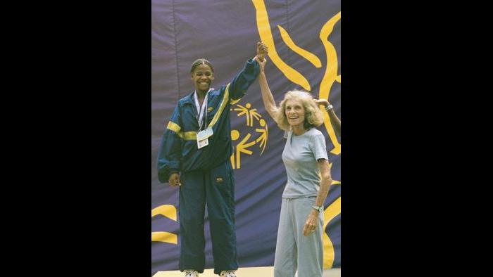 Eunice Kennedy Shriver and an athlete at the 1999 Special Olympics World Summer Games in North Carolina. (Courtesy Special Olympics)