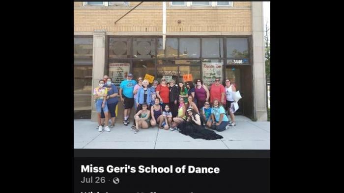 Participants in a car parade to celebrate the dance studio gather outside of Miss Geri’s. (Courtesy of Cheryl Morris)