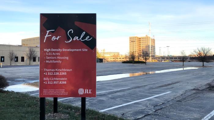 The proposed Carvana site, currently five acres of parking lot. (Patty Wetli / WTTW News)