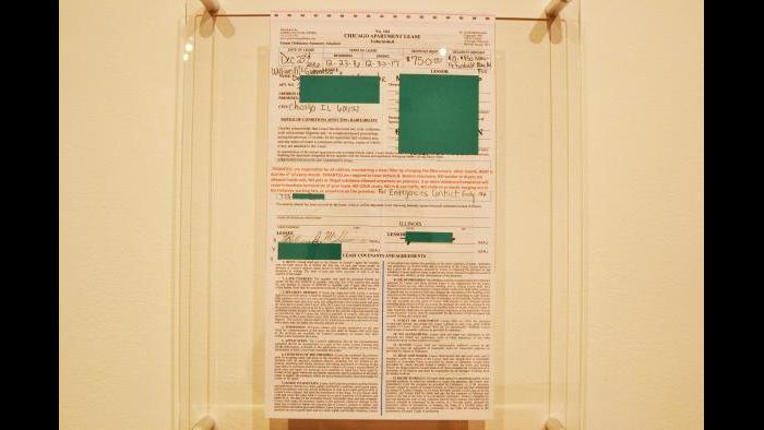 A copy of the lease with personal information blacked out for the apartment the two men are currently living. (Maya Miller / Chicago Tonight)