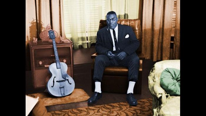 Portrait of Howlin' Wolf (Chester Burnett) at his home during an interview with Mike Bloomfield, Chicago, Illinois, 1964. Raeburn Flerlage image, colorized.