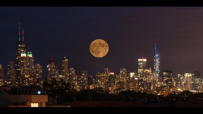 Photo by J. Scott Sykora: This photo was taken on top of my house in Lincoln Park before the clouds rolled in which subsequently blocked the eclipse.