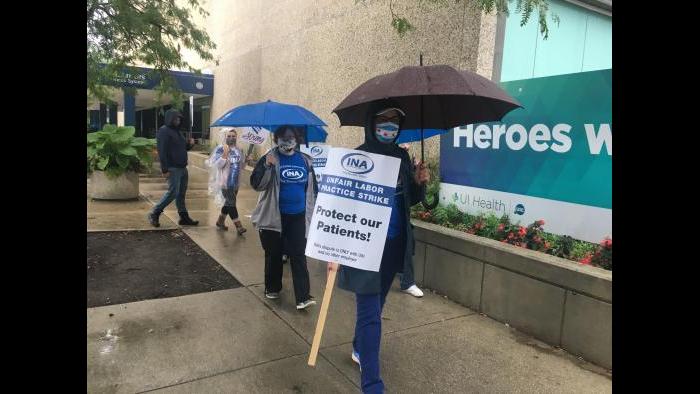 Nurses strike outside the University of Illinois Hospital on Saturday, Sept. 12, 2020, the first day of a planned seven-day strike. (Alma Campos / WTTW News)