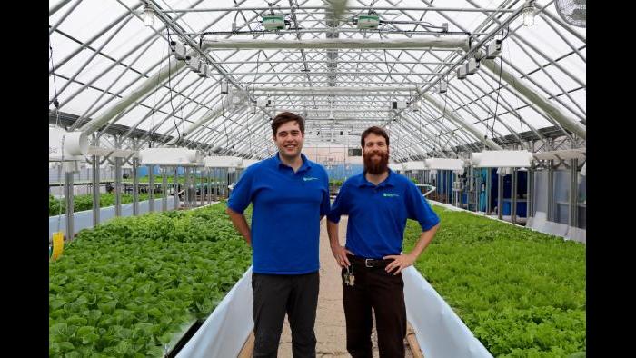 Metropolitan Farms founder and CEO Benjamin Kant, left, and co-founder and COO Shockey Funke inside the Metropolitan Farms greenhouse. (Evan Garcia)