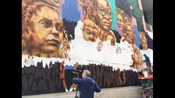 WTTW cameraman Dave Moyer films the progress of Kerry James Marshall’s largest work to date.