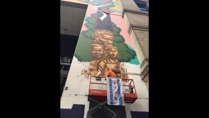 WTTW cameraman Dave Moyer films the progress of Kerry James Marshall’s largest work to date.