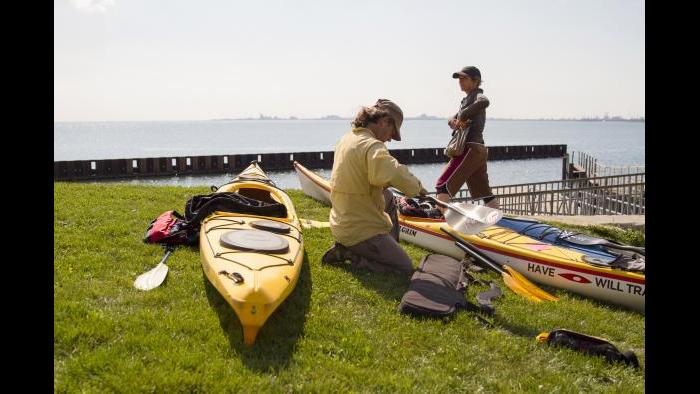 Planning for our paddle along the Calumet River. (Luke Brodarick / Chicago Tonight)