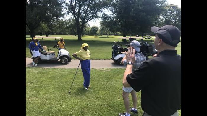 Jay Shefsky and photographer Dave Moyer film Ernestine Harper and other members of the Chicago Women’s Golf Club at Joe Louis “The Champ” Golf Course in Riverdale.