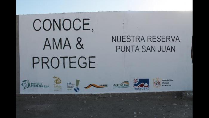 A mural reading "Know, Love and Protect our Punta San Juan Reserve" adorns one of the walls at Punta San Juan. (Photo courtesy of Punta San Juan/Chicago Zoological Society)