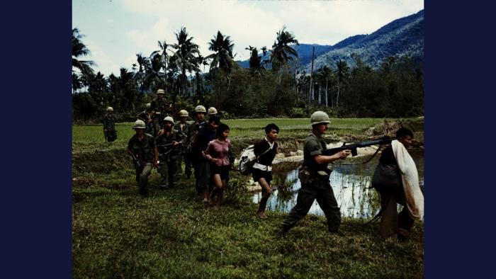 Captured, 1967. Members of U.S. Army 1st Cavalry Division return to base camp in the An Lao Valley with Viet Cong prisoners. Photo by Specialist 5 Robert C. Lafoon, U.S. Army.