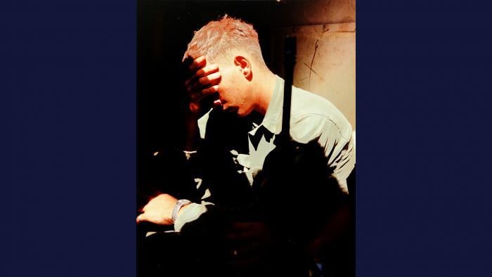 Drained, 1967. An exhausted soldier from the U.S. Army 25th Infantry Division takes a break inside a M113 Armored Personnel Carrier near Củ Chi. Photo by Specialist 5 Robert C. Lafoon, U.S. Army.