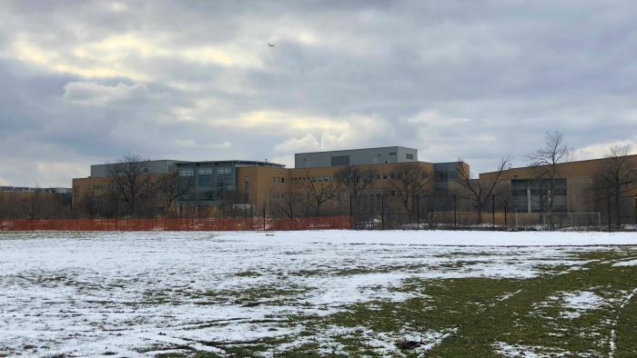 Neighbors complain that the removal of trees and shrubs has laid bare "eyesores" on the opposite bank, including Northside College Prep, a CTA bus barn and a Marines Corps Reserve Training Center. (Patty Wetli / WTTW News)