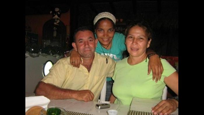 Luciana Diaz photographed with her parents in Valencia, Venezuela.