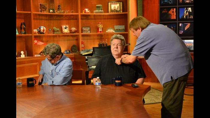 George Wendt gets miked up. (Kristen Thometz/Chicago Tonight)