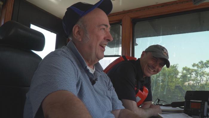 Jay Shefsky in the pilot house with Captain Larry Van Dusen. 