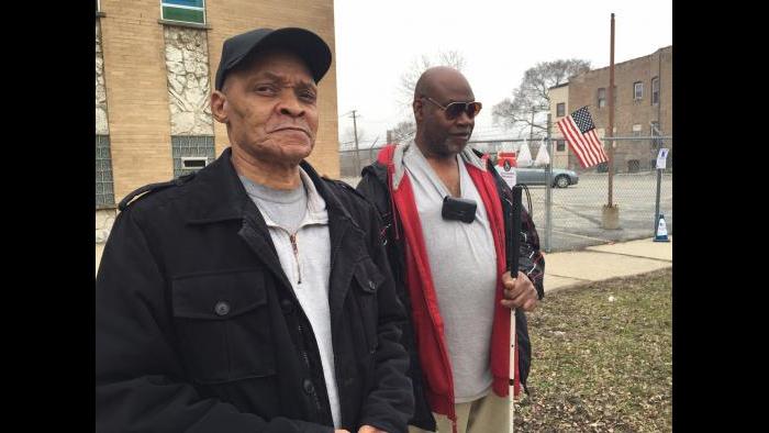 Perry, left, and Ronald Boyd at their 20th Ward polling place on Tuesday. (Eddie Arruza)