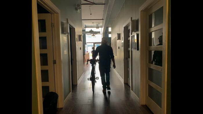 A bike owner is reunited with his bike on Sunday, Aug. 23, 2020. (Grace Del Vecchio / WTTW News)