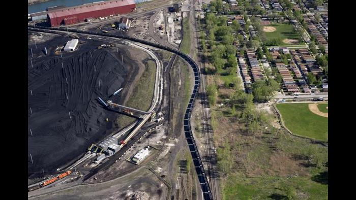 Petcoke-laden train snaking through the East Side neighborhood, 2015.(Terry Evans / Courtesy of Museum of Contemporary Photography)